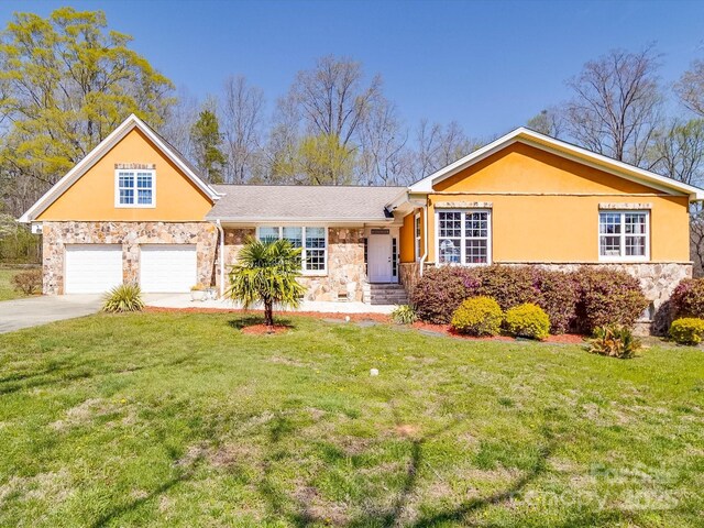 605 Allen Way, Indian Trail, NC 28079 - ranch-style house with stone siding, stucco siding, and a front yard