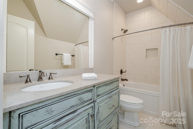 bathroom featuring shower / tub combo with curtain, vanity, and toilet