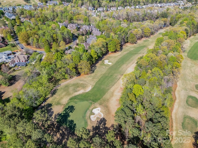 birds eye view of property featuring view of golf course