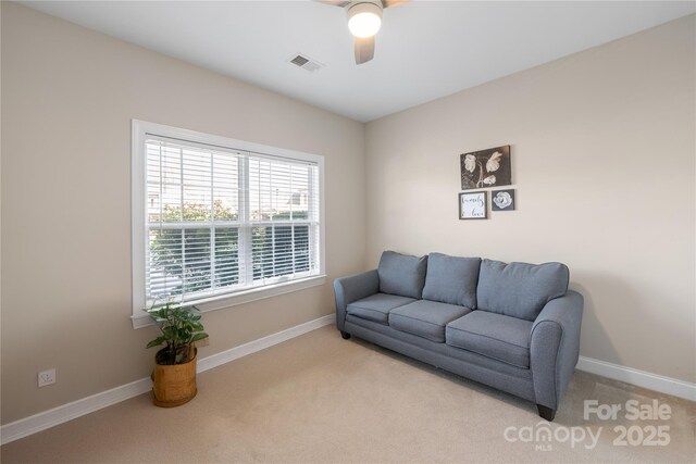 2783 Clover Rd NW, Concord, NC 28027 - carpeted living room with ceiling fan and baseboards