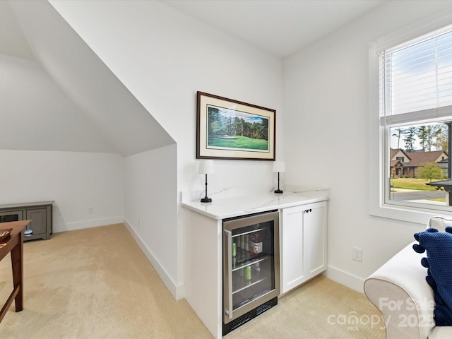 911 Abilene Ln, Fort Mill, SC 29715 - indoor dry bar with wine cooler, light colored carpet, lofted ceiling, and baseboards