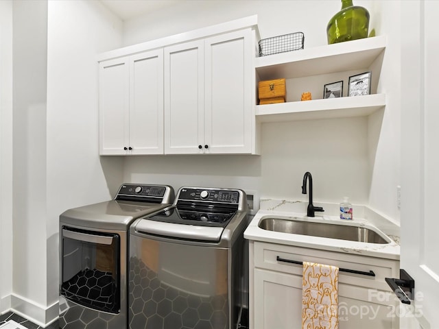 911 Abilene Ln, Fort Mill, SC 29715 - laundry area with washing machine and clothes dryer, cabinet space, and baseboards