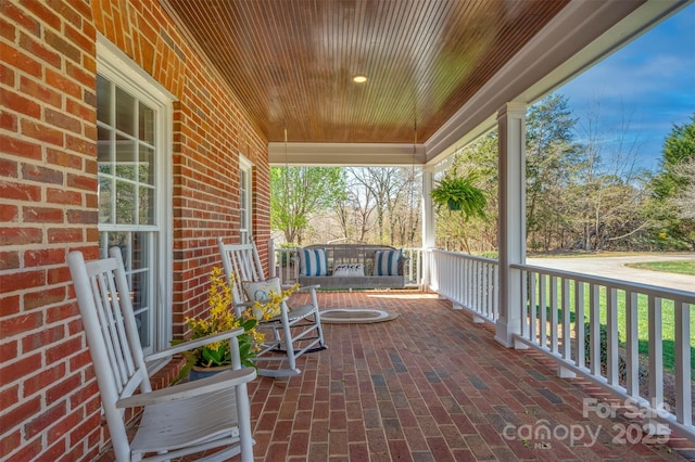 view of patio featuring covered porch