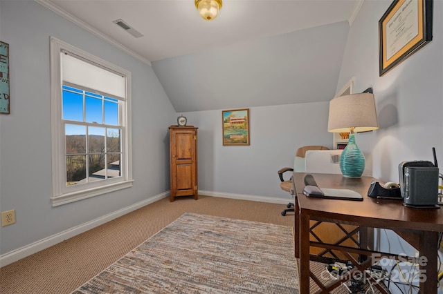 carpeted home office with baseboards, visible vents, vaulted ceiling, and crown molding
