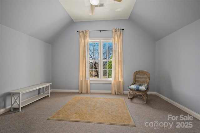 unfurnished room featuring baseboards, lofted ceiling, ceiling fan, and carpet flooring