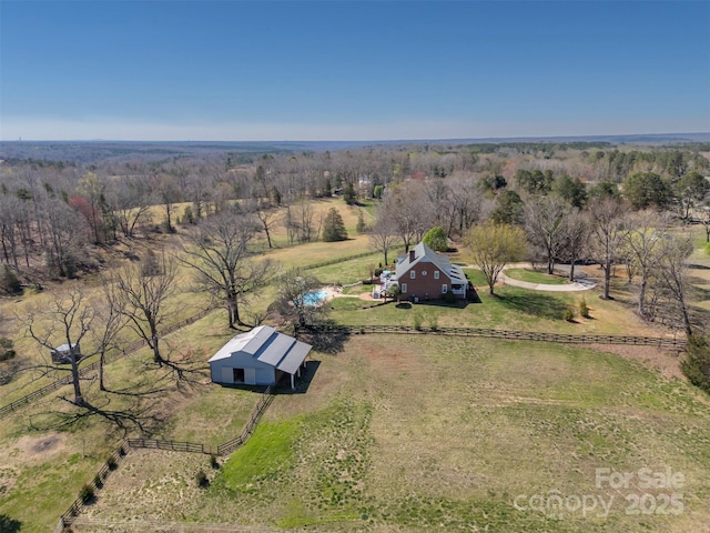 birds eye view of property featuring a rural view