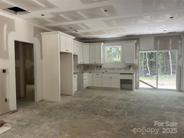 318 Stanback St, Mount Gilead, NC 27306 - kitchen with white cabinets and light countertops