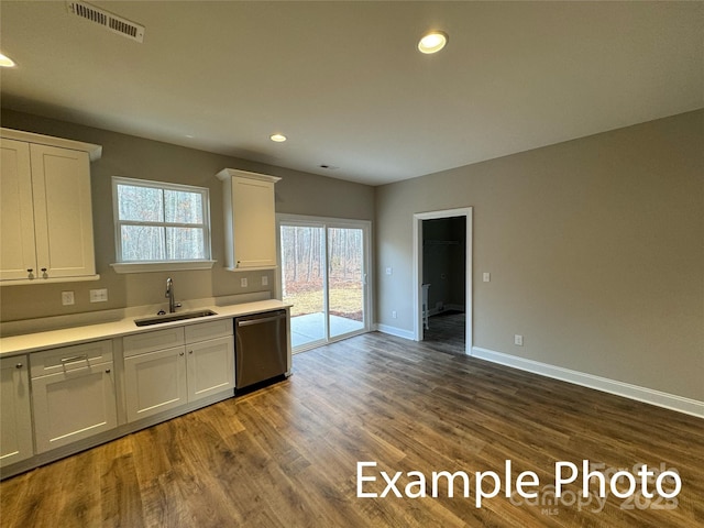 318 Stanback St, Mount Gilead, NC 27306 - kitchen featuring dishwasher, white cabinetry, light countertops, dark wood finished floors, and recessed lighting