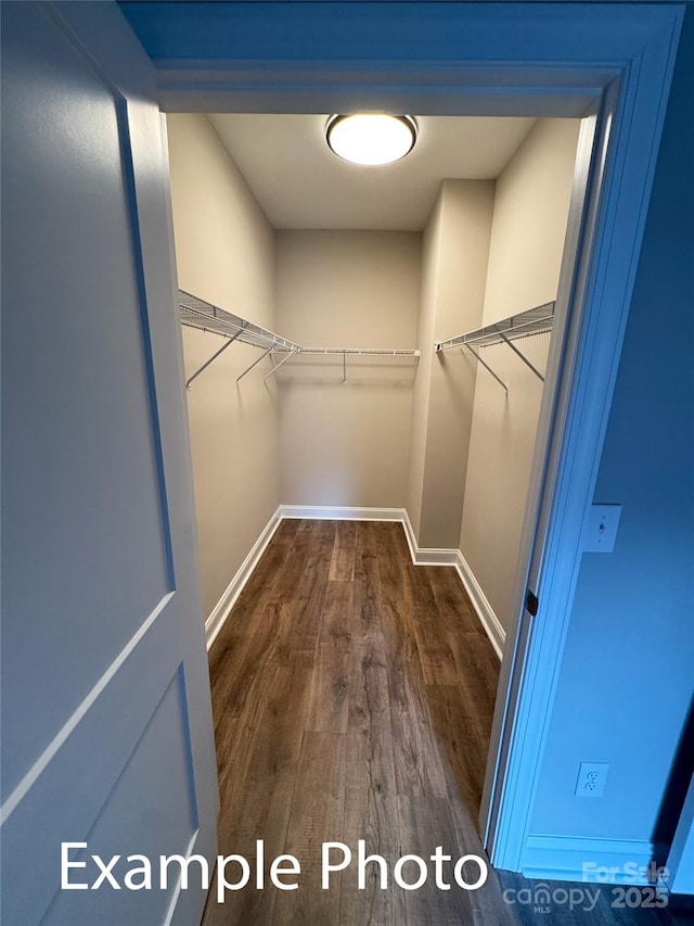 318 Stanback St, Mount Gilead, NC 27306 - spacious closet with dark wood-style flooring
