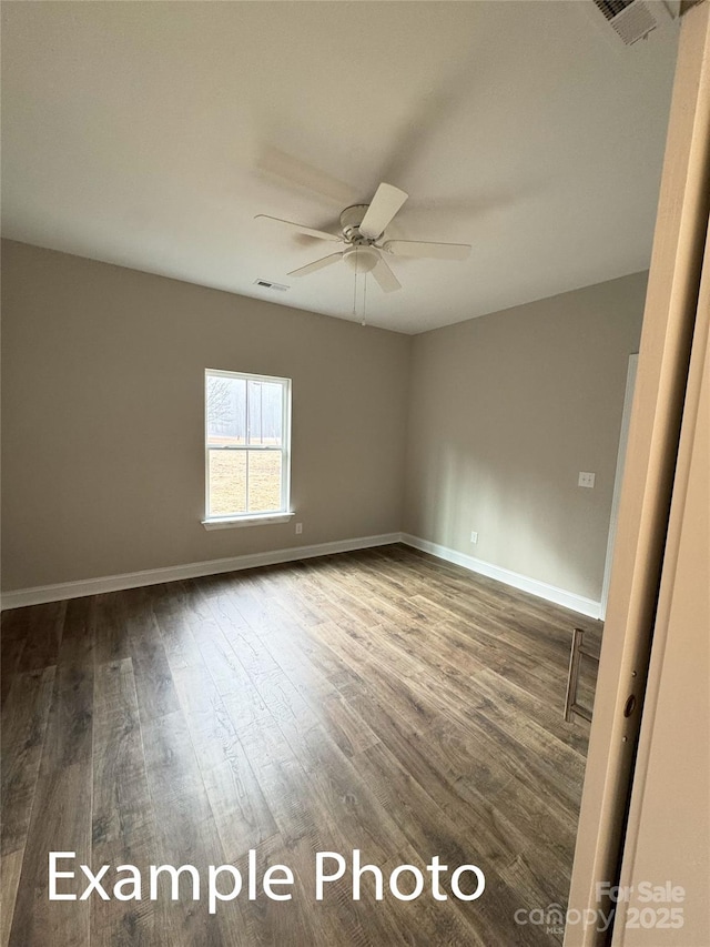 318 Stanback St, Mount Gilead, NC 27306 - empty room with dark wood-style flooring and ceiling fan