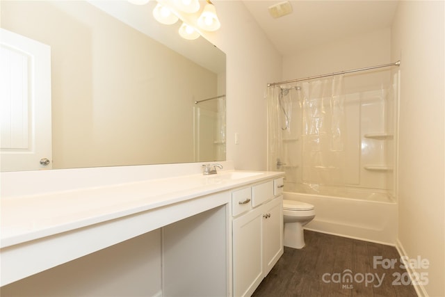 full bath featuring toilet, shower / bath combination with curtain, vanity, and wood finished floors