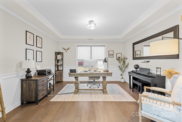 7313 Glenroe Dr, Huntersville, NC 28078 - office featuring wood finished floors, a raised ceiling, wainscoting, and crown molding