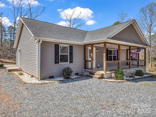 view of front facade with roof with shingles, crawl space, and a porch