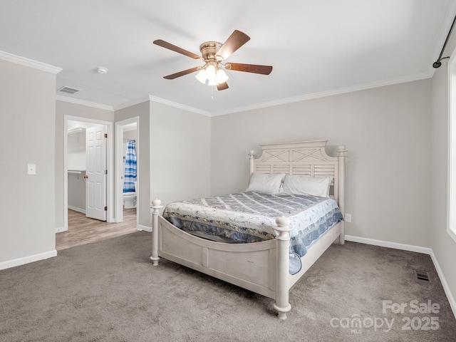 carpeted bedroom with baseboards, ornamental molding, visible vents, and ceiling fan