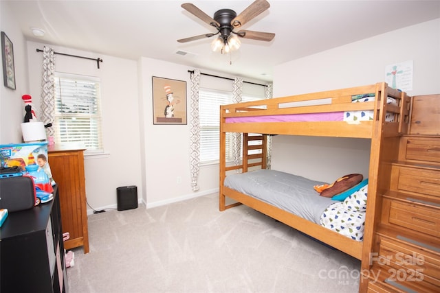 154 Rooster Tail Ln, Troutman, NC 28166 - carpeted bedroom with baseboards and a ceiling fan