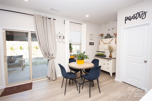 154 Rooster Tail Ln, Troutman, NC 28166 - dining space with light wood-type flooring, recessed lighting, and baseboards