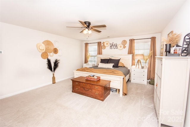 154 Rooster Tail Ln, Troutman, NC 28166 - bedroom featuring light colored carpet, multiple windows, and a ceiling fan