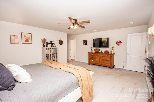 154 Rooster Tail Ln, Troutman, NC 28166 - bedroom with light carpet, ceiling fan, and baseboards