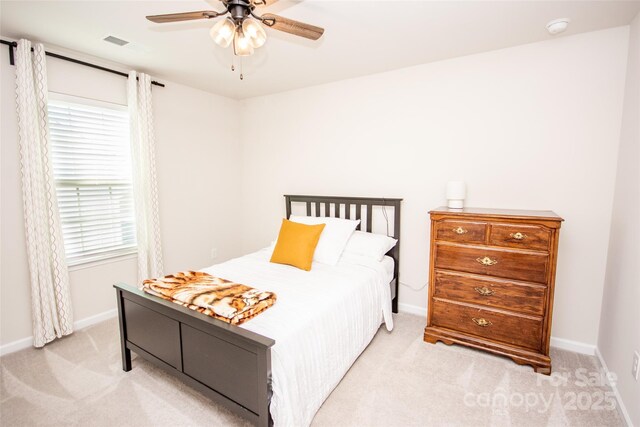 154 Rooster Tail Ln, Troutman, NC 28166 - bedroom with carpet floors, baseboards, and a ceiling fan