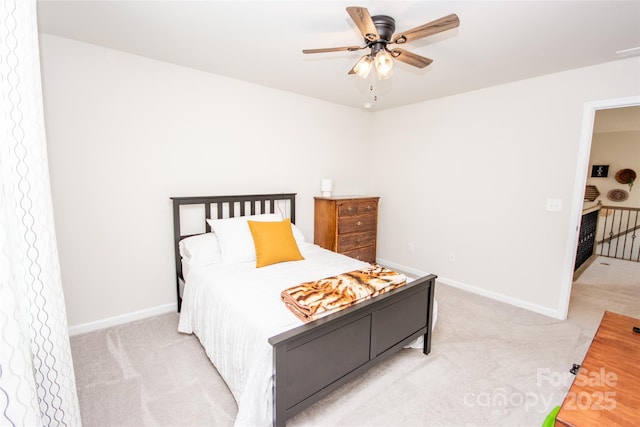 154 Rooster Tail Ln, Troutman, NC 28166 - bedroom with light colored carpet, baseboards, and ceiling fan