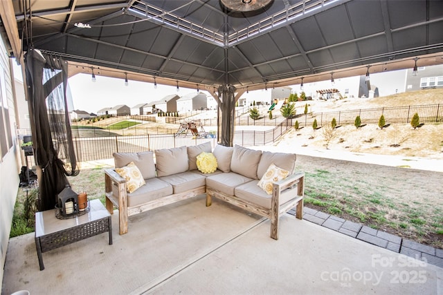 154 Rooster Tail Ln, Troutman, NC 28166 - view of patio with an outdoor living space, a gazebo, fence, and a residential view