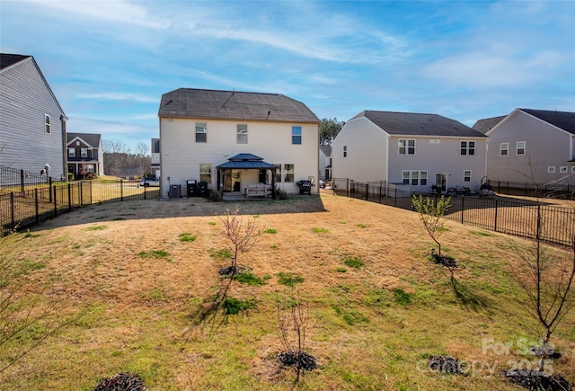 154 Rooster Tail Ln, Troutman, NC 28166 - back of house featuring a gazebo and a residential view