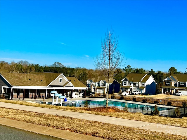154 Rooster Tail Ln, Troutman, NC 28166 - view of pool with fence and a residential view