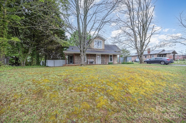128 Allenton St, Norwood, NC 28128 - view of front of property featuring a front lawn and fence