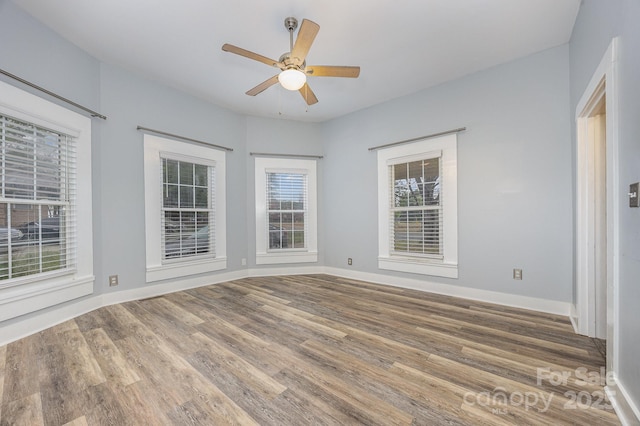 128 Allenton St, Norwood, NC 28128 - empty room with ceiling fan, wood finished floors, and baseboards