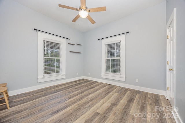 128 Allenton St, Norwood, NC 28128 - empty room featuring wood finished floors, baseboards, and a ceiling fan