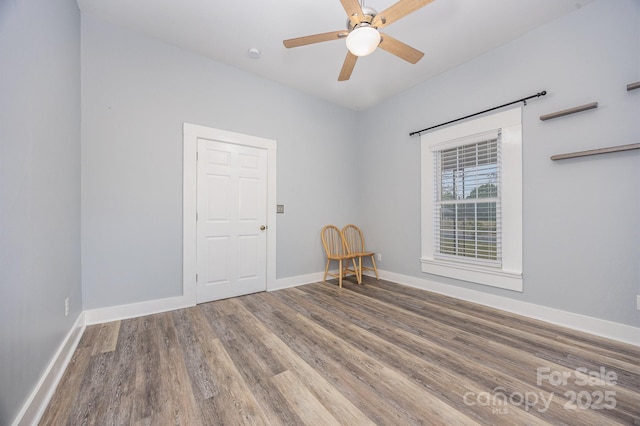 128 Allenton St, Norwood, NC 28128 - spare room featuring ceiling fan, baseboards, and wood finished floors