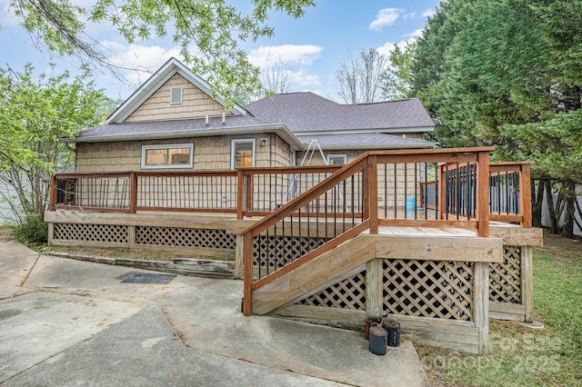 128 Allenton St, Norwood, NC 28128 - rear view of house with a wooden deck and a shingled roof