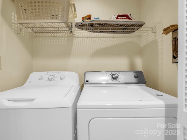 laundry room featuring laundry area and washer and clothes dryer