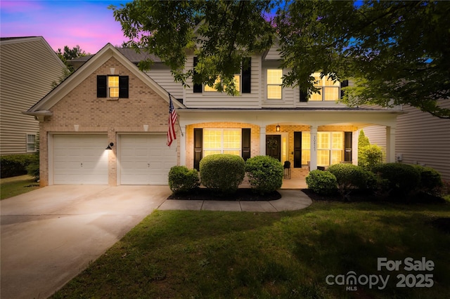 20827 Brinkley St, Cornelius, NC 28031 - traditional-style house featuring brick siding, driveway, covered porch, a yard, and a garage