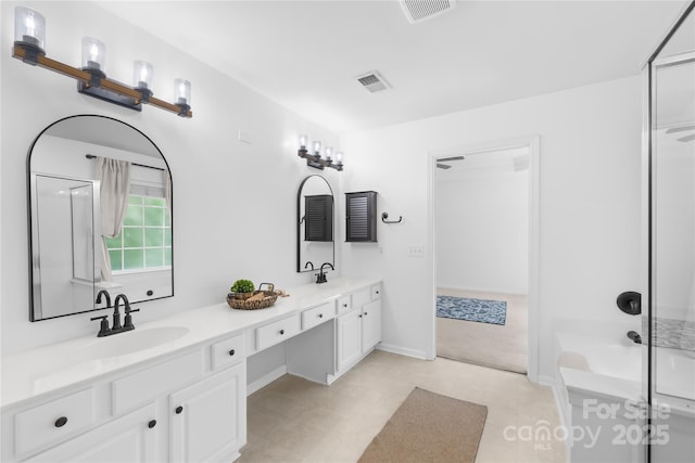 20827 Brinkley St, Cornelius, NC 28031 - full bath with double vanity, a shower with door, and tile patterned floors
