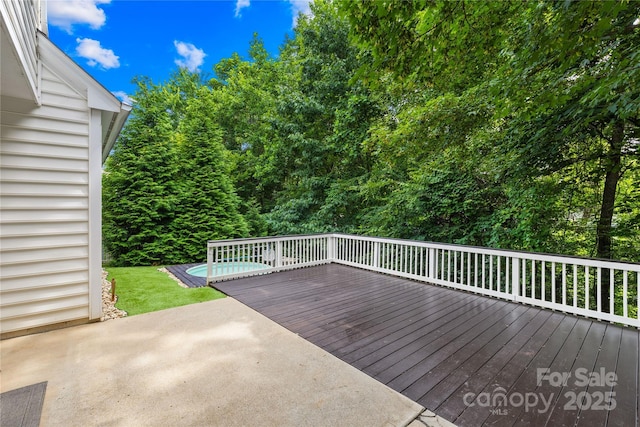 20827 Brinkley St, Cornelius, NC 28031 - wooden deck with a patio area