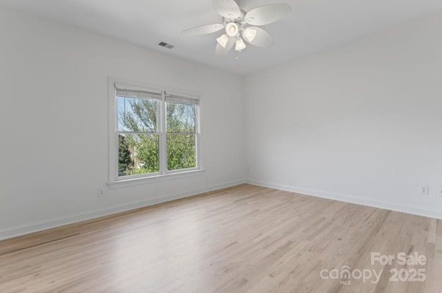 15009 Lisha Ln, Charlotte, NC 28277 - empty room featuring a ceiling fan, baseboards, light wood finished floors, and visible vents