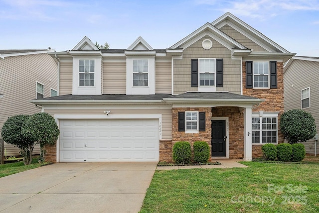 view of front of home with driveway, a front yard, stone siding, and a garage