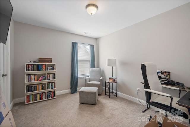 carpeted home office featuring baseboards and visible vents