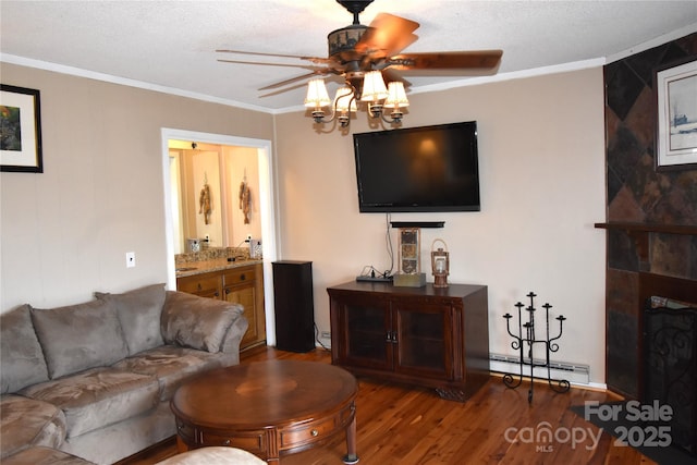 301 Pinnacle Inn Rd Unit 3219, Beech Mountain, NC 28604 - living area featuring a baseboard radiator, a ceiling fan, wood finished floors, ornamental molding, and baseboard heating