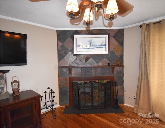 301 Pinnacle Inn Rd Unit 3219, Beech Mountain, NC 28604 - living room with a fireplace, wood finished floors, crown molding, a chandelier, and baseboards
