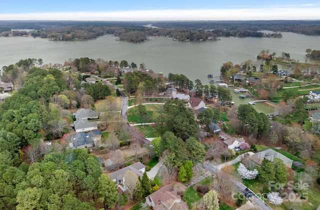 birds eye view of property with a residential view and a water view