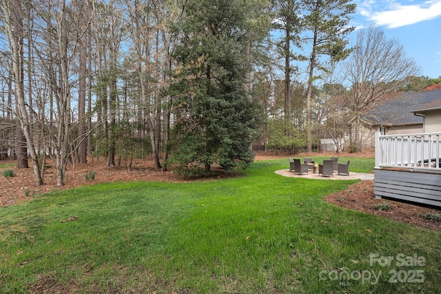 view of yard with a deck