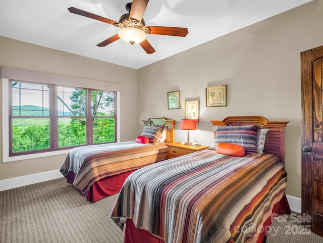 556 High Pines Loop, Lake Lure, NC 28746 - carpeted bedroom with baseboards and a ceiling fan