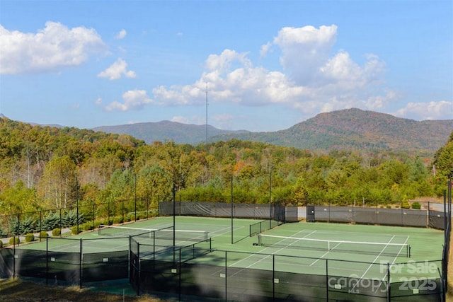 556 High Pines Loop, Lake Lure, NC 28746 - view of tennis court with a forest view and a mountain view