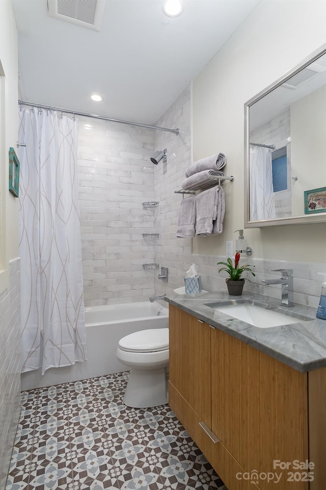 107 Cherry St, Black Mountain, NC 28711 - full bath with shower / tub combo, vanity, recessed lighting, toilet, and visible vents