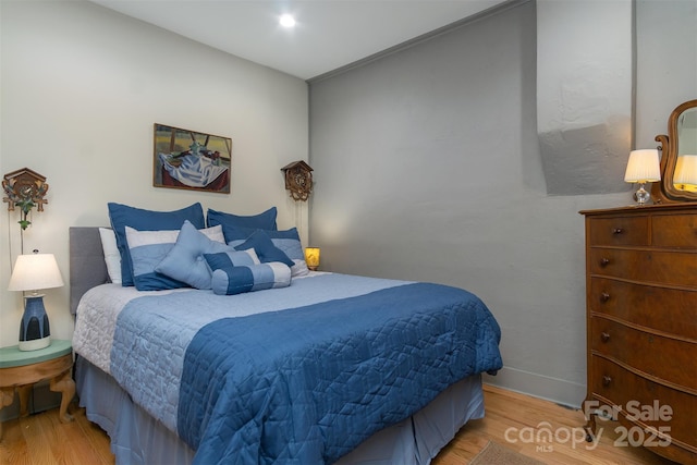 107 Cherry St, Black Mountain, NC 28711 - bedroom with baseboards and wood finished floors