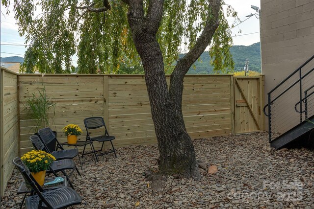107 Cherry St, Black Mountain, NC 28711 - view of yard with a mountain view, fence, and a gate