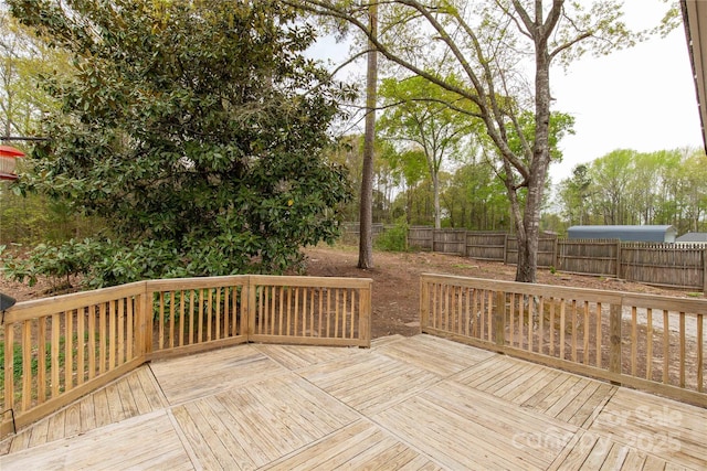 deck featuring fence private yard