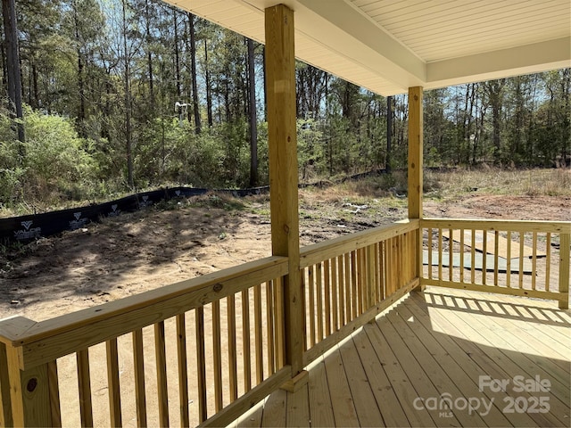 1259 Willow Grove Ln Unit 100, York, SC 29745 - deck featuring view of wooded area